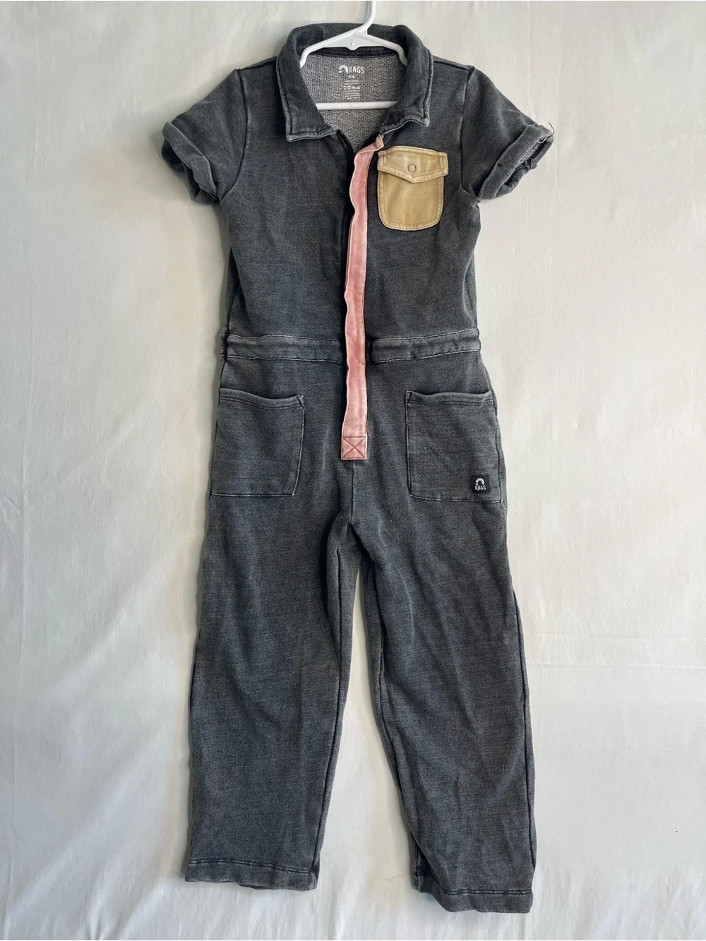 Rags to Raches Charcoal One-Piece Bodysuit with‎ Pink Zip and Tan Pocket